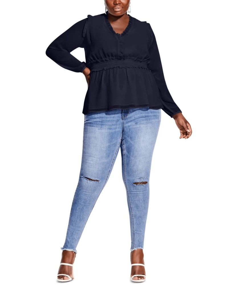 Front of a model wearing a size 22W City Chic Women's Plus Ruffled Peplum Hem Top Blue Size 22W in Blue by City Chic. | dia_product_style_image_id:311059